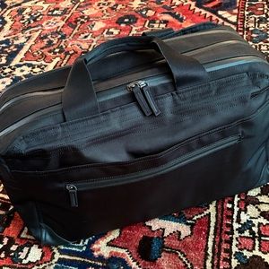 Pakt one suitcase-black with shoulder strap, gently used